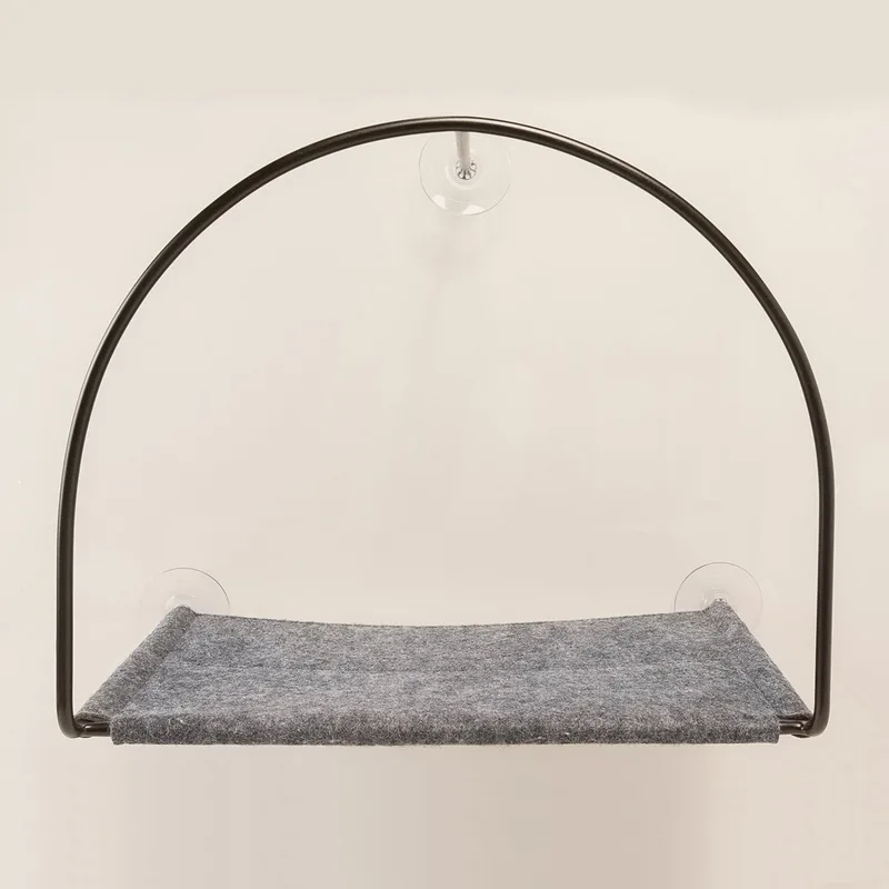 The Cloud Nine window hammock, a grey felt sling on a black steel frame with suction cups